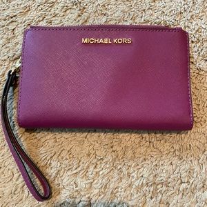 Purple Michael Kors wristlet wallet preloved great condition